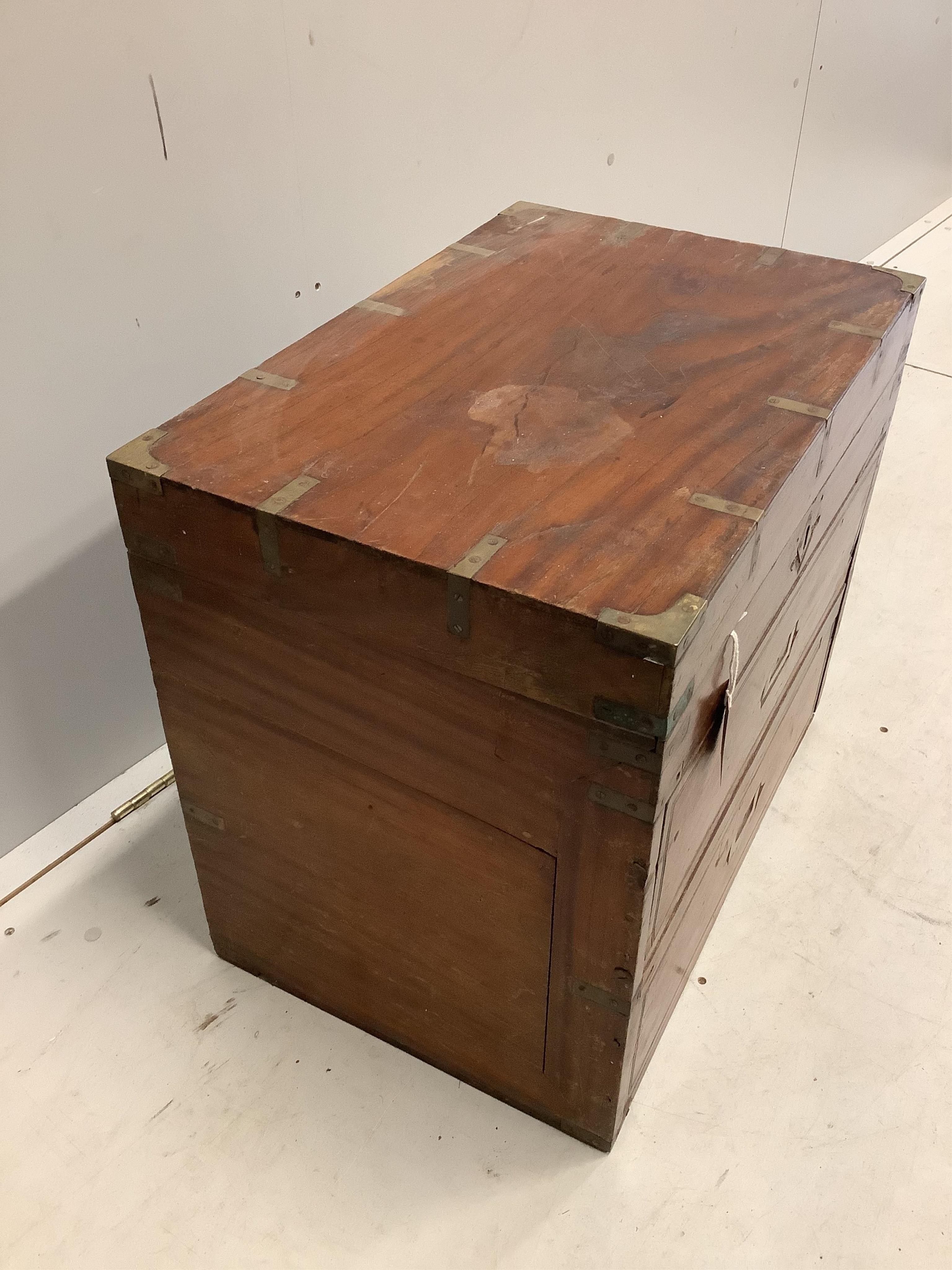 A 19th century brass mounted teak trunk with dummy drawer front, width 60cm, depth 41cm, height 54cm. Condition - fair